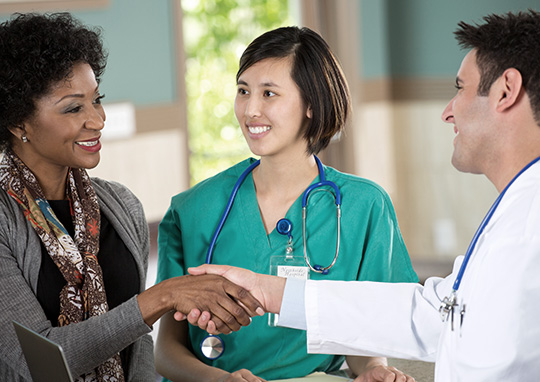 Patients Shaking Hands with Doctor