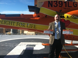 Scott Phillips holding flight for lift license plates