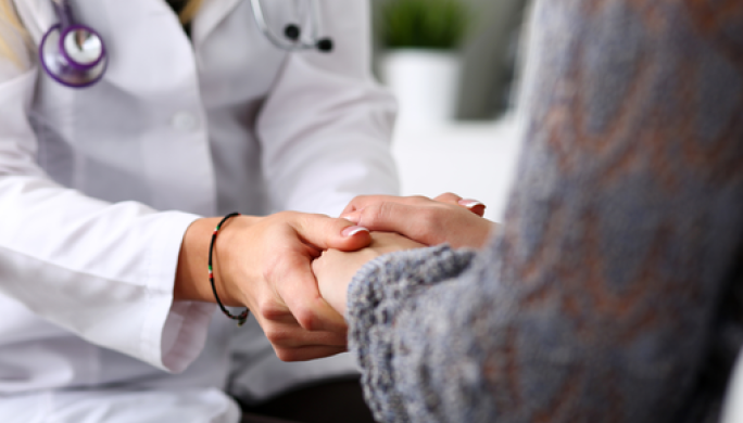 Provider Holding Patient Hands