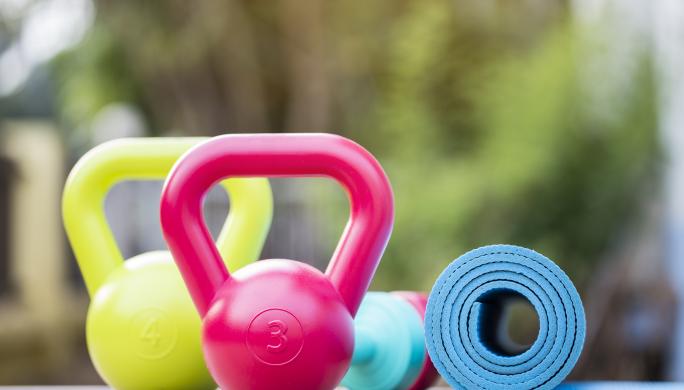 kettlebells and yoga mat